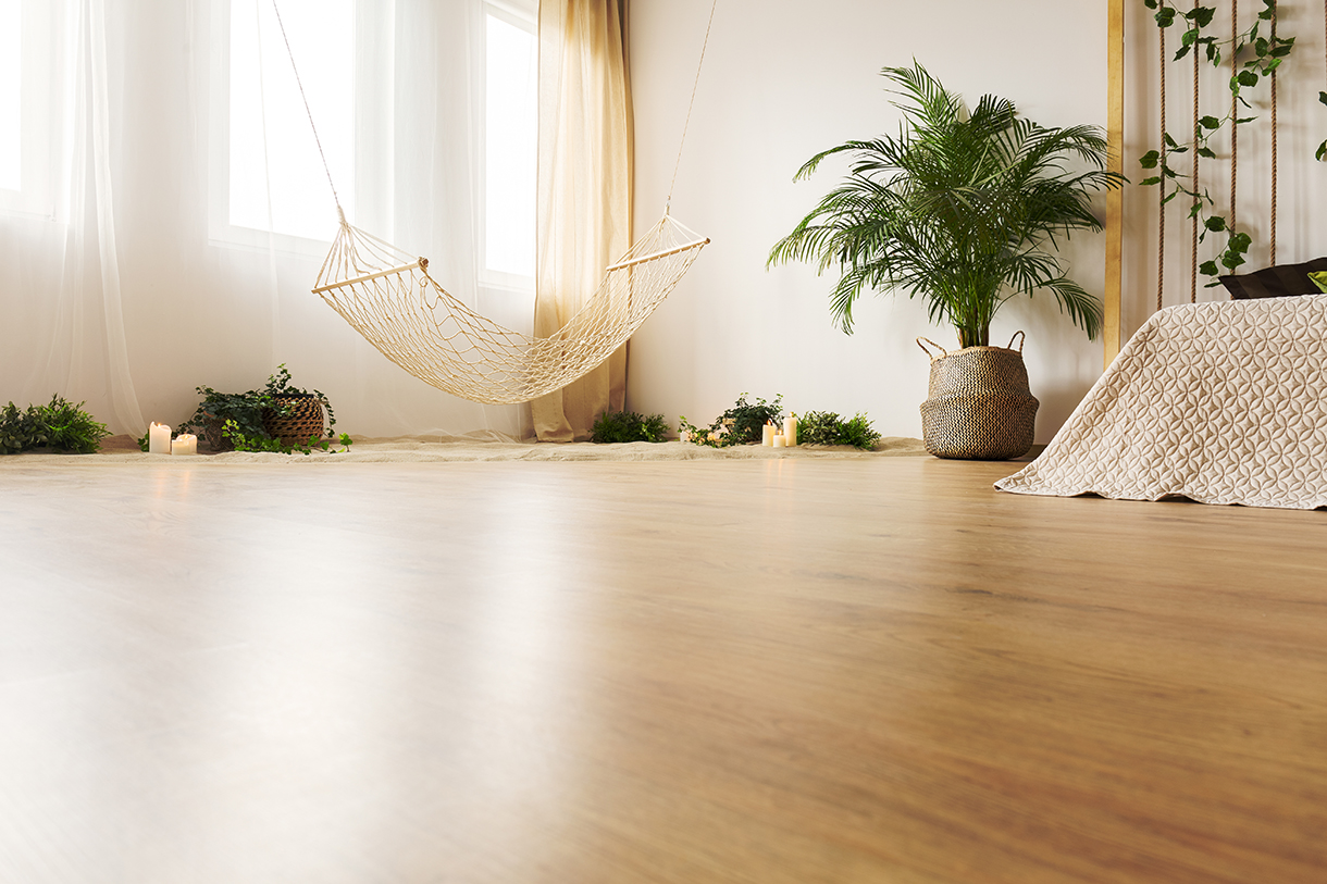 Restored original hardwood floor in the bedroom of an older Edmonton home